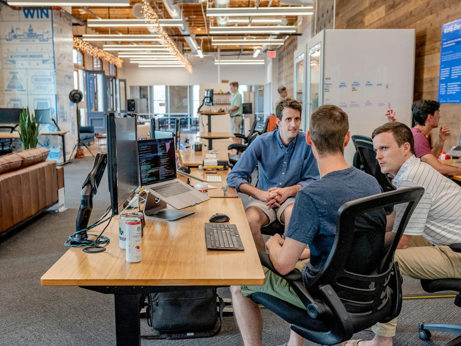 Business professionals discussing plans in a modern office